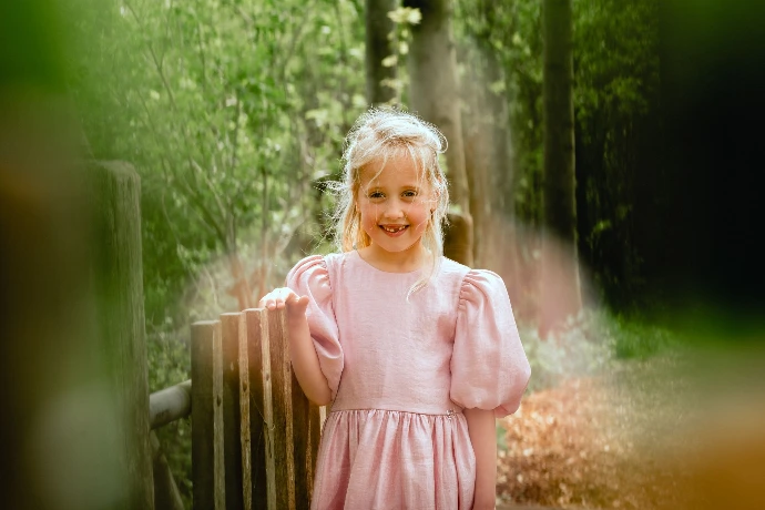 Communie fotosessie in Deinze met charmante natuurdetails