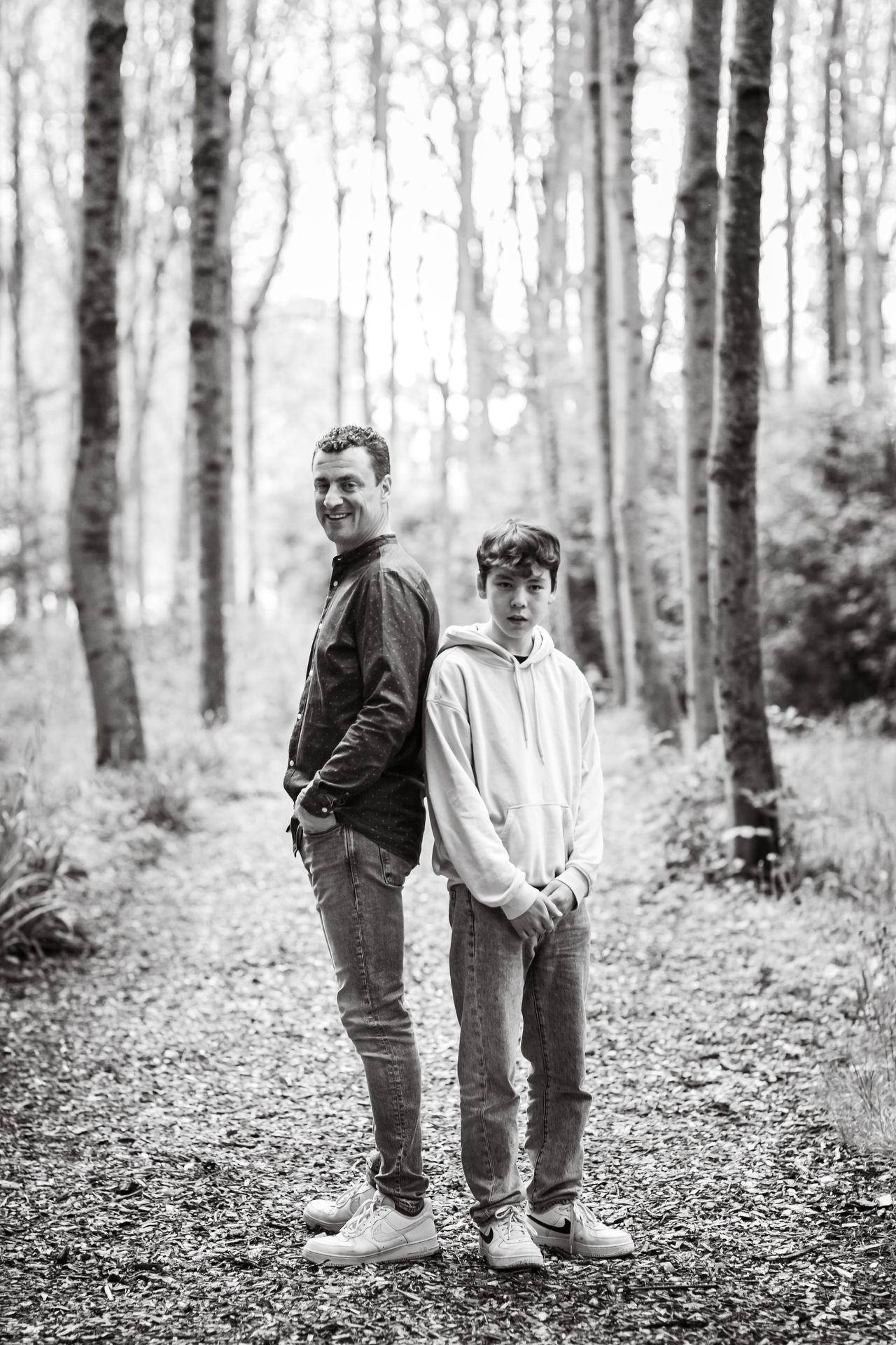 Professionele familiefoto’s in Brielmeersen Deinze, parklandschap en speelse kinderen.