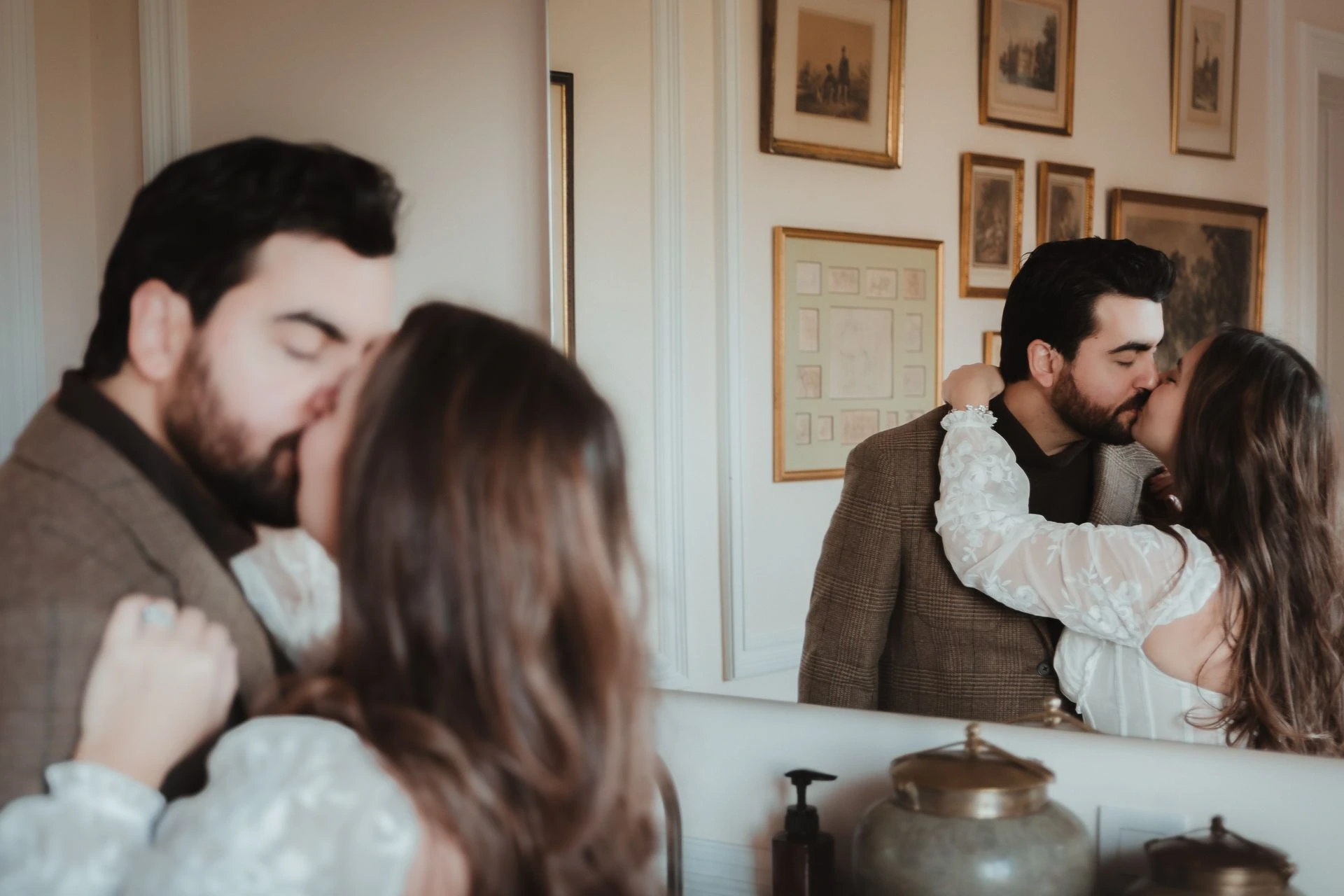 American couple sharing a loving glance during a castle photoshoot in Belgium.