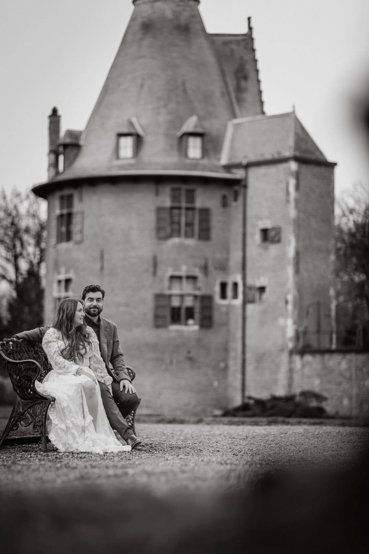 Romantic anniversary photoshoot of an American couple walking near Ooidonk Castle.