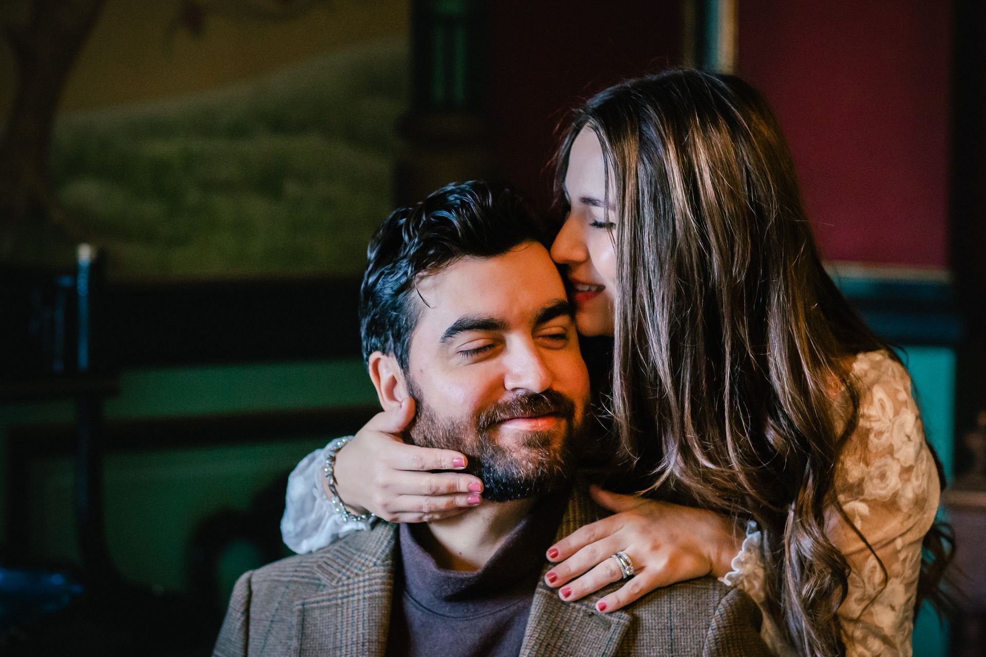 Couple embracing during a romantic anniversary session at Ooidonk Castle.